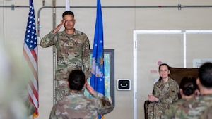 U.S. Airmen attend a change of command ceremony.
