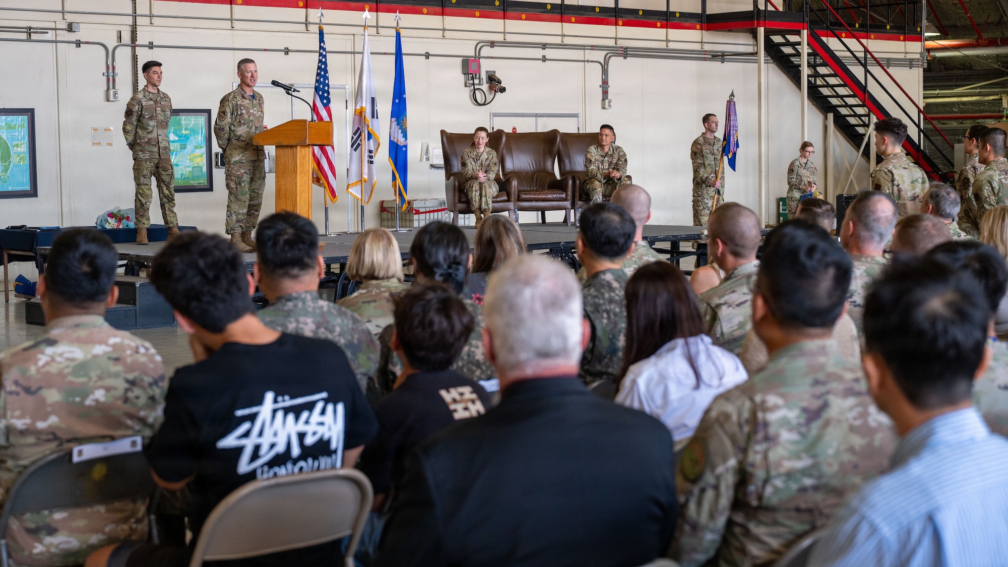 U.S. Airmen attend a change of command ceremony.