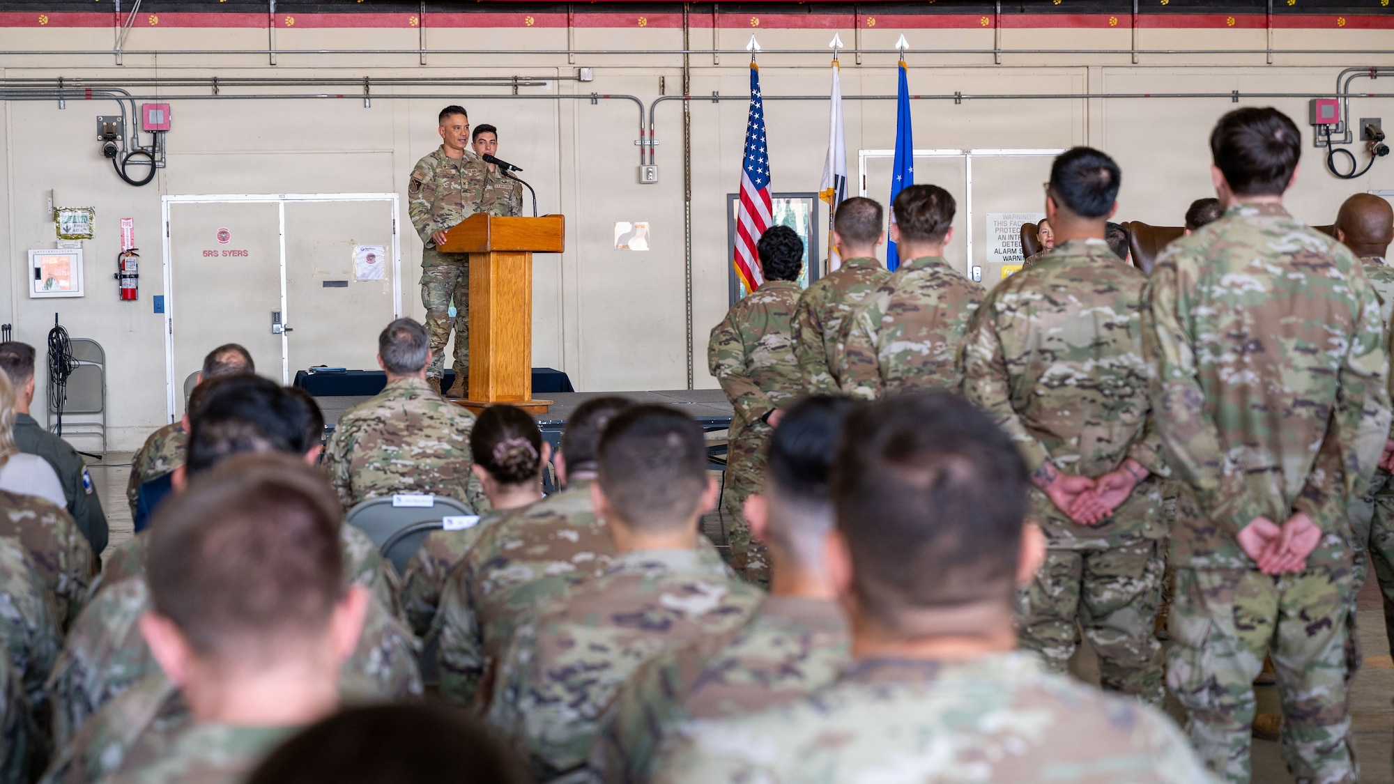 U.S. Airmen attend a change of command ceremony.