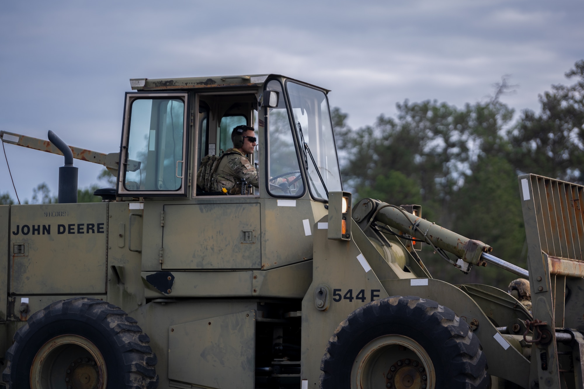 U.S. Air Force Senior Airman Andres Acevedo Lugo, an air transportation journeyman assigned to the 156th Contingency Response Group, Puerto Rico Air National Guard, loads cargo during exercise Sentry South-Southern Strike at Camp Shelby Joint Forces Training Center, Hattiesburg, Mississippi, Feb. 4, 2025. Exercise Sentry South-Southern Strike is a joint military partnership that strengthens contingency response operations, agile combat employment, aeromedical evacuation, joint maritime training, specialized fueling operations and intra-theater airlift and airdrop. (U.S. Air National Guard photo by Senior Airman Gisselle Toro Caraballo)