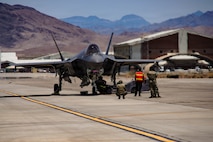 A U.S. Air Force F-35A Lightning II aircraft assigned to the 65th Aggressor Squadron receives a hot-pit refuel on the flightline at Creech Air Force Base, Nevada, June 17, 2026. The exercise brought together support from five wings, seven groups and 17 squadrons across maintenance, logistics, operations, medical, security, safety, fuels, fire emergency services, airfield operations and host-base support. (U.S. Air Force photo by Staff Sgt. Jake Jacobsen)