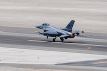 A U.S. Air Force F-16C Fighting Falcon aircraft assigned to the 64th Aggressor Squadron takes off from the runway during exercise VENOM FORGE at Creech Air Force Base June 17, 2026. These exercises help maintain the skills required to maintain advanced airpower in operations worldwide. (U.S. Air Force photo by Airman Vinh Phan)