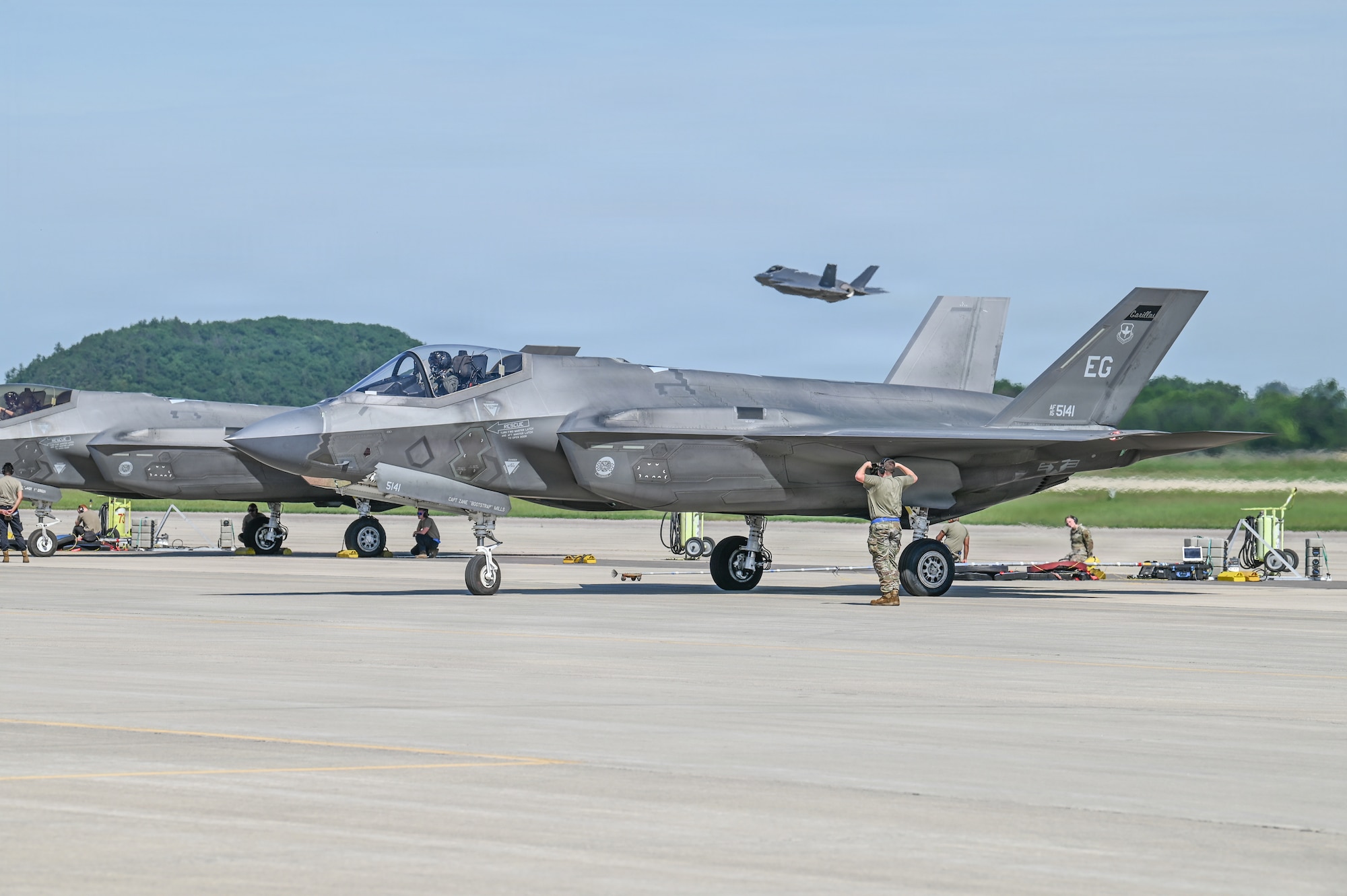 A U.S. Air Force tactical aircraft maintenance specialist assigned to the 33rd Fighter Wing, Florida Air National Guard, marshals an F-35A Lightning II aircraft for launch during Sentry North 2026 at Volk Field Combat Readiness Training Center, Camp Douglas, Wisconsin, June 4, 2026. Sentry North 2026 is a joint total force exercise led by the National Guard Bureau Readiness Training Program and hosted by Volk Field Combat Readiness Training Center and Alpena Combat Readiness Training Center. (U.S. Air National Guard photo by Master Sgt. Mary Greenwood)