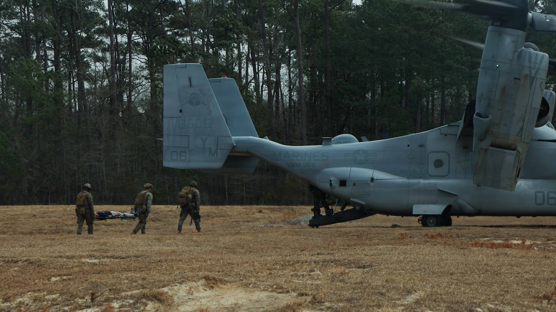 U.S. Marines with Kilo Company, 3rd Battalion, 2nd Marine Regiment, 24th Marine Expeditionary Unit, transport a simulated casualty during a casualty evacuation scenario as part of the MEU’s certification exercise on Marine Corps Base Camp Lejeune, North Carolina, Feb. 20, 2026. CERTEX is a land-based pre-deployment exercise that enhances the integration and collective capability of the Marine Air-Ground Task Force while providing the 24th MEU with an opportunity to train and execute operations in any clime, or place. (U.S. Marine Corps photo by Cpl. Daniel R. Garcia)