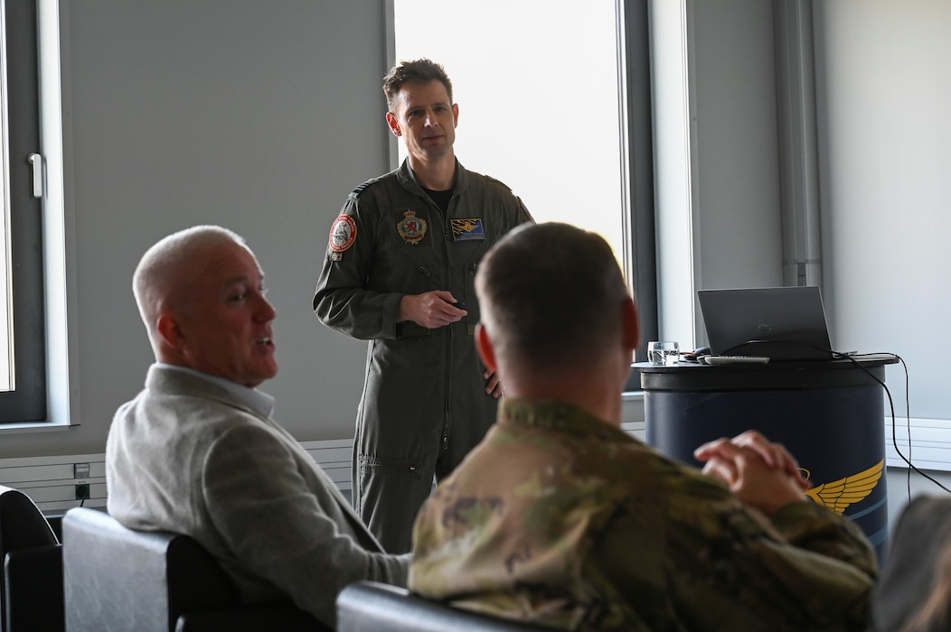Belgian Air Force Col. Davy Compeers, 10th Tactical Wing commander, conducts a mission briefing during Bill White’s, U.S. Ambassador to Belgium, base visit.