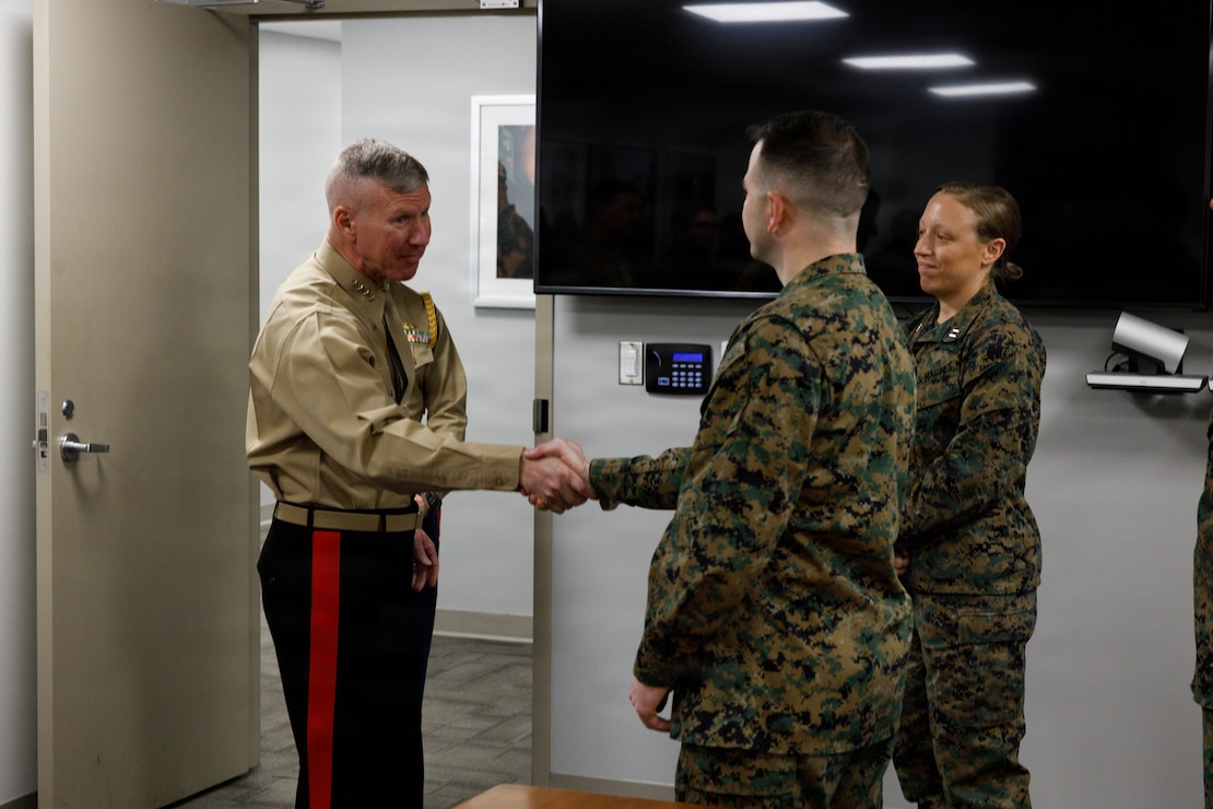 The 39th Commandant of the Marine Corps, Gen. Eric M. Smith, left, greets Capt. Austin Wiemann, the programs and assessments section head for Training and Education Command, at Marine Corps Base Quantico, Virginia, Feb. 18, 2026. Gen. Smith visited TECOM to recognize and award Marines for their performance. (U.S. Marine Corps photo by Cpl. Memphis Pitts)