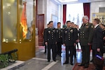 In this handout photo released by Russian Defense Ministry Press Service, Chief of the Military Academy of the General Staff of the Armed Forces of the Russian Federation Col. Gen. Vladimir Zarudnitsky, left, escorts China's Defense Minister Gen. Li Shangfu during a visit to Military Academy of the General Staff of the Armed Forces of the Russian Federation in Moscow, Russia, Monday, April 17, 2023. (Russian Defense Ministry Press Service via AP)