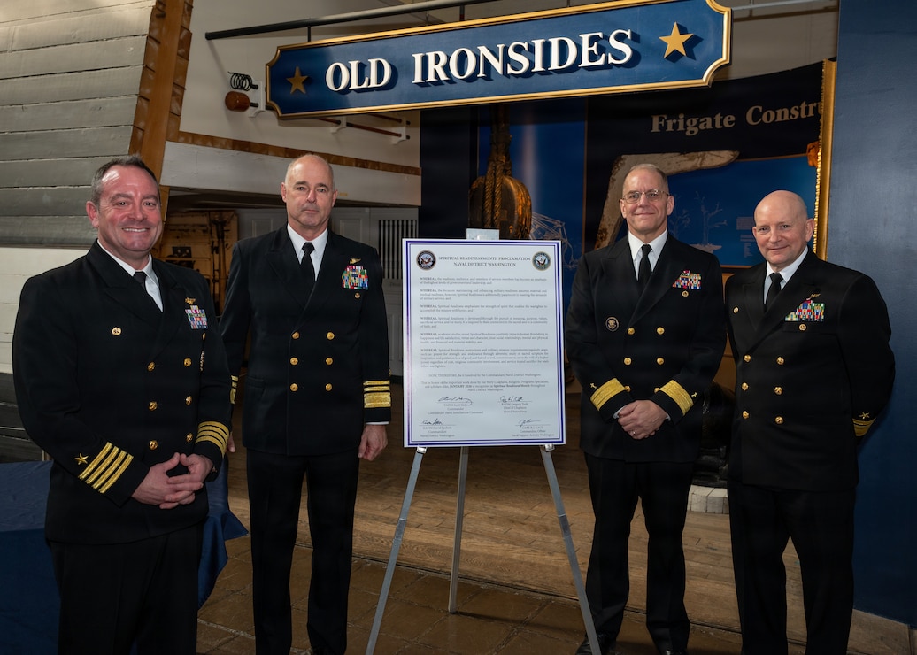 WASHINGTON (January 15th, 2026) -- (Left to Right) Capt. Ryan Gaul, Commanding Officer, Naval Support Activity Washington, Vice Admiral Scott Gray, Commander, Navy Installations Command, Rear Admiral Carey Cash, Chaplain of the Marine Corps, and Rear Adm. David Faehnle, Commandant, Naval District Washington, pose for a photo after signing a proclamation recognizing January as Spiritual Readiness month at the Navy Museum on the Washington Navy Yard. The proclamation underscores the Navy’s commitment to strengthening physical, mental and spiritual readiness and resilience to support mission success for Sailors and their families.  (U.S. Navy photo by Mass Communication Specialist 1st Class Griffin Kersting)