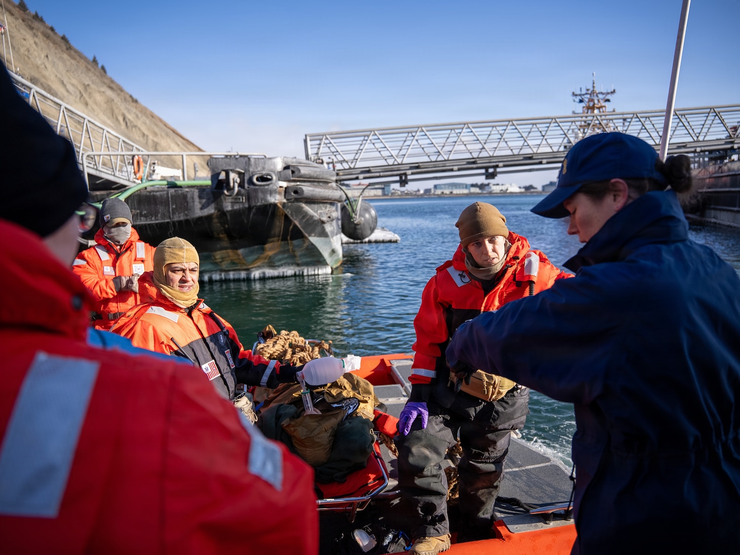 U.S. Navy Sailors assigned to En-route Care System (ERCS) Team 52, and medical professionals from the U.S. Coast Guard participate in a ship-to-shore medical evacuation exercise as part of ARCTIC EDGE 2026 (AE26) in Kodiak, Alaska, Feb. 26, 2026. AE26 is a NORAD and U.S. Northern Command-led homeland defense exercise designed to improve readiness, demonstrate capabilities, and enhance Joint and Allied Force interoperability in the Arctic. (U.S. Navy photo by Mass Communication Specialist 1st Class Abigayle Lutz)
