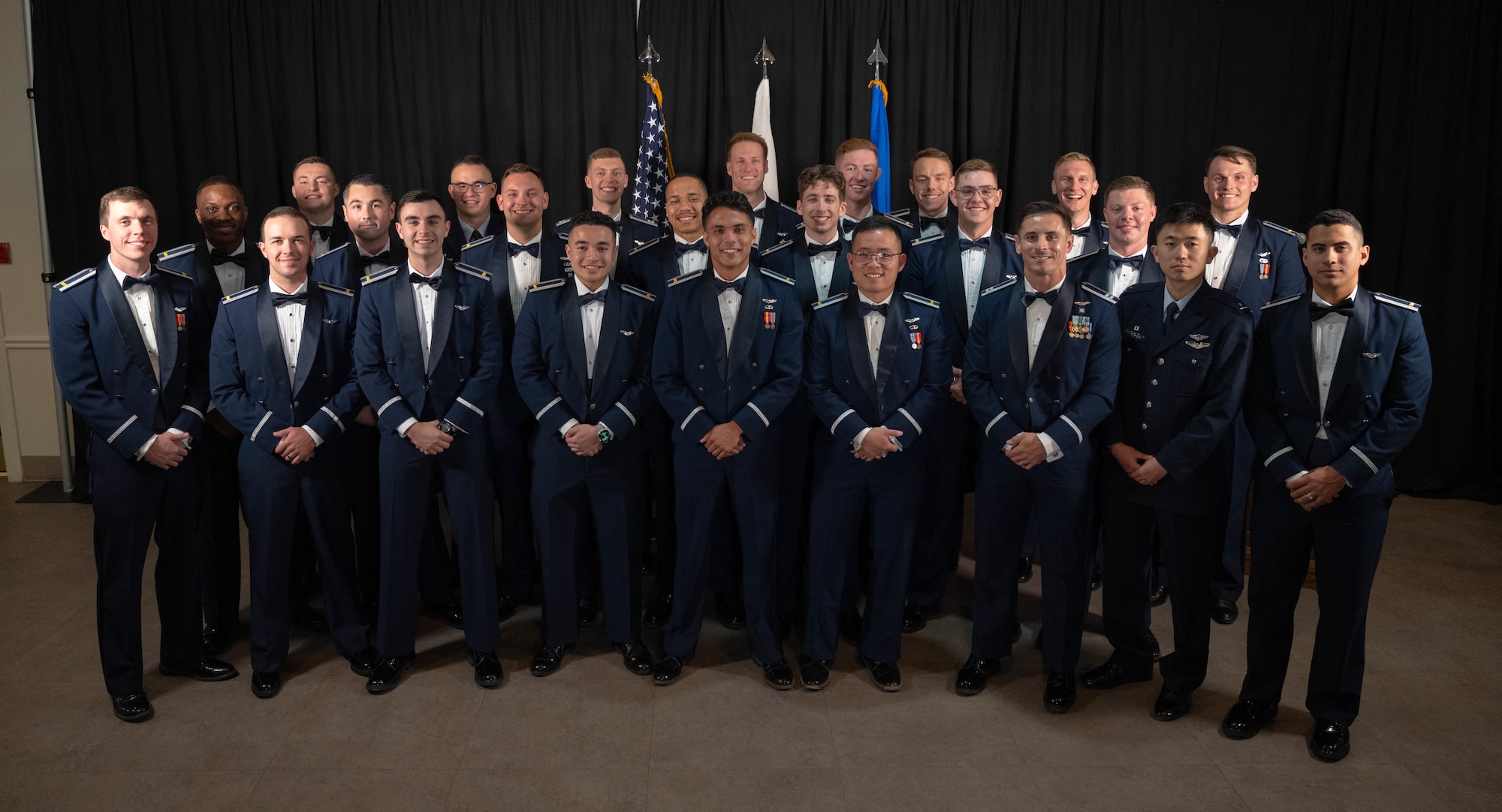 U.S. Air Force and Japanese officers from graduating Class 26-06 come together for a group photo at Laughlin Air Force Base, Texas, Feb. 26, 2026. Twenty-four U.S. Air Force and Japanese officers were recognized for their successful completion of Undergraduate Pilot Training. (U.S. Air Force photo by Airman 1st Class Darryl Keith)