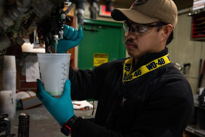 TRFB Team Member mixes paint at the TRFB Paint Shop at TRFB.
