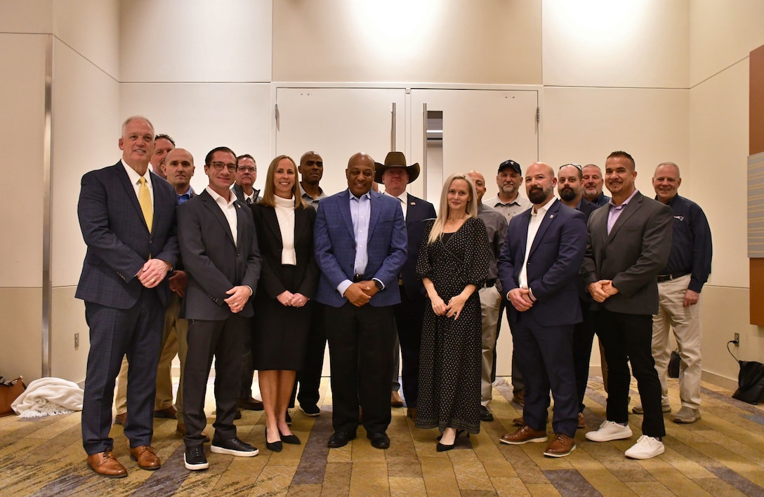 A group of people pose for a photo.