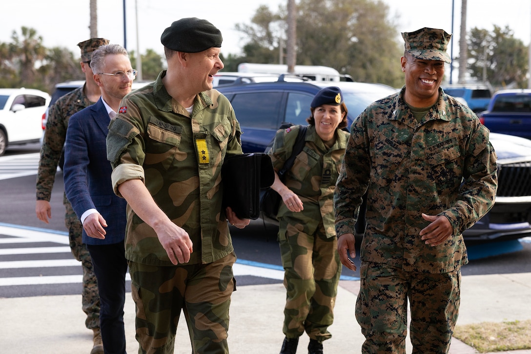 Norway Army Maj. Gen. Anders Jernberg, commander of the Norwegian Defense Logistics Organization, speaks with U.S. Marine Corps Col. David Merles, commanding officer of Blount Island Command, during a visit Feb. 27, 2026, to Marine Corps Support Facility Blount Island in Jacksonville, Florida, to discuss Arctic prepositioning, forward sustainment and NATO readiness in the High North. (U.S. Marine Corps photo by Dustin Senger)
