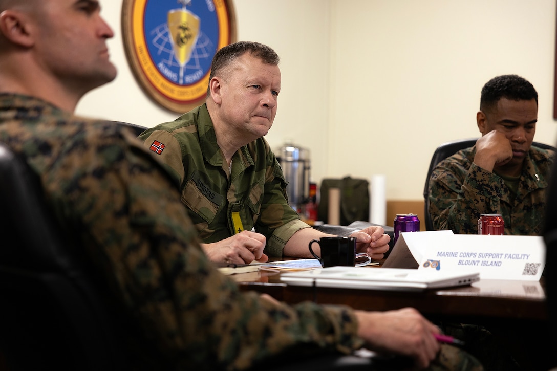 Norway Army Maj. Gen. Anders Jernberg, commander of the Norwegian Defense Logistics Organization, listens to a capabilities brief with U.S. Marine Corps Col. David Merles, commanding officer of Blount Island Command, during a visit Feb. 27, 2026, at Marine Corps Support Facility Blount Island in Jacksonville, Florida, during a visit focused on Arctic prepositioning and NATO readiness in the High North. (U.S. Marine Corps photo by Dustin Senger)