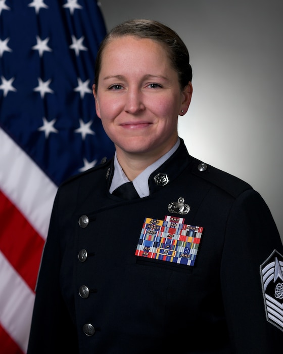Women in Space Force uniform smiling