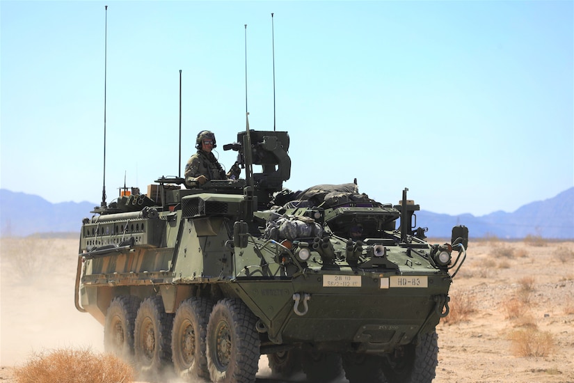 U.S. Soldiers assigned to 1st Battalion, 112 Infantry Regiment, 56th Stryker Brigade Combat Team, 28th Infantry Division (PA ARNG) conduct convoy operations utilizing Stryker Armored Vehicles during Decisive Action Rotation 22-08 at the National Training Center, Fort Irwin, Calif., June 26, 2022. Rotations at the National Training Center ensure Army Brigade Combat Teams remain versatile, responsive, and consistently available for current and future contingencies. (U.S. Army photo by Spc. Aaron Walker)