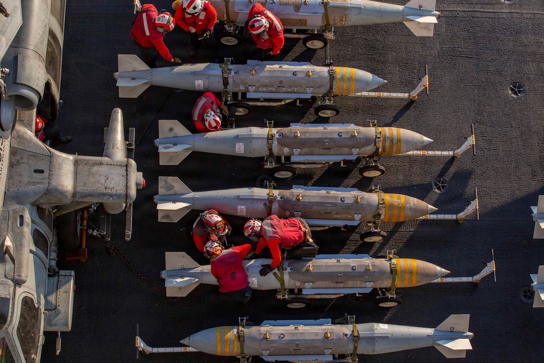 U.S. Sailors prepare to stage ordnance on the flight deck of Nimitz-class aircraft carrier USS Abraham Lincoln (CVN 72) in support of Operation Epic Fury, Feb. 28, 2026. (U.S. Navy photo)