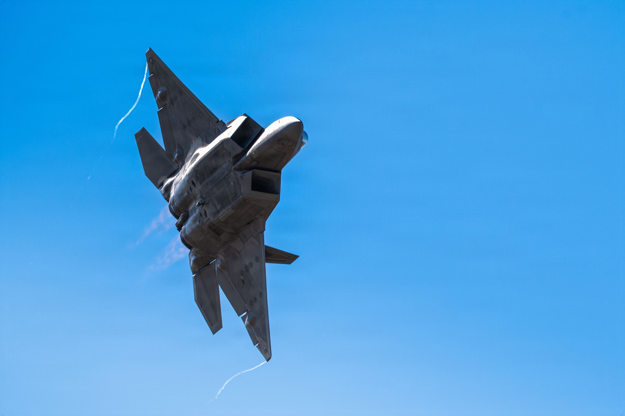 A U.S. Air Force Capt. Nicholas “Laz” Le Tourneau F-22 Demonstration Team commander and pilot flies a F-22 Raptor aircraft during the Heritage Flight Training Course at Davis-Monthan Air Force Base, Arizona, Feb. 27, 2026. Le Tourneau leads the 14-member F-22 Demo Team, oversees maintenance actions performed on one of the most advanced fighter jets ever built, and showcases the Raptor’s exceptional maneuverability for more than 10 million spectators around the world each year. (U.S. Air Force photo by Senior Airman Jasmyne Bridgers-Matos)