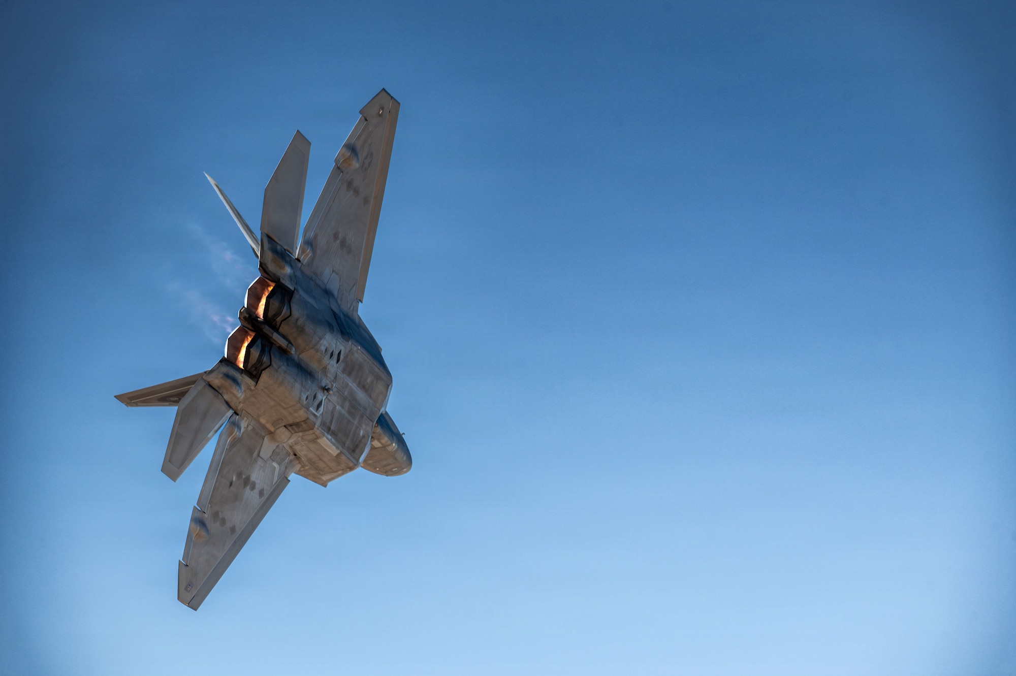 A U.S. Air Force Capt. Nicholas “Laz” Le Tourneau F-22 Demonstration Team commander and pilot flies a F-22 Raptor aircraft during the Heritage Flight Training Course at Davis-Monthan Air Force Base, Arizona, Feb. 27, 2026. The F-22 Raptor Aerial Demonstration showcases the unmatched maneuverability of the airframe by executing a series of combat maneuvers to inspire Americans and their allies, and deter foreign adversaries. (U.S. Air Force photo by Senior Airman Jasmyne Bridgers-Matos)