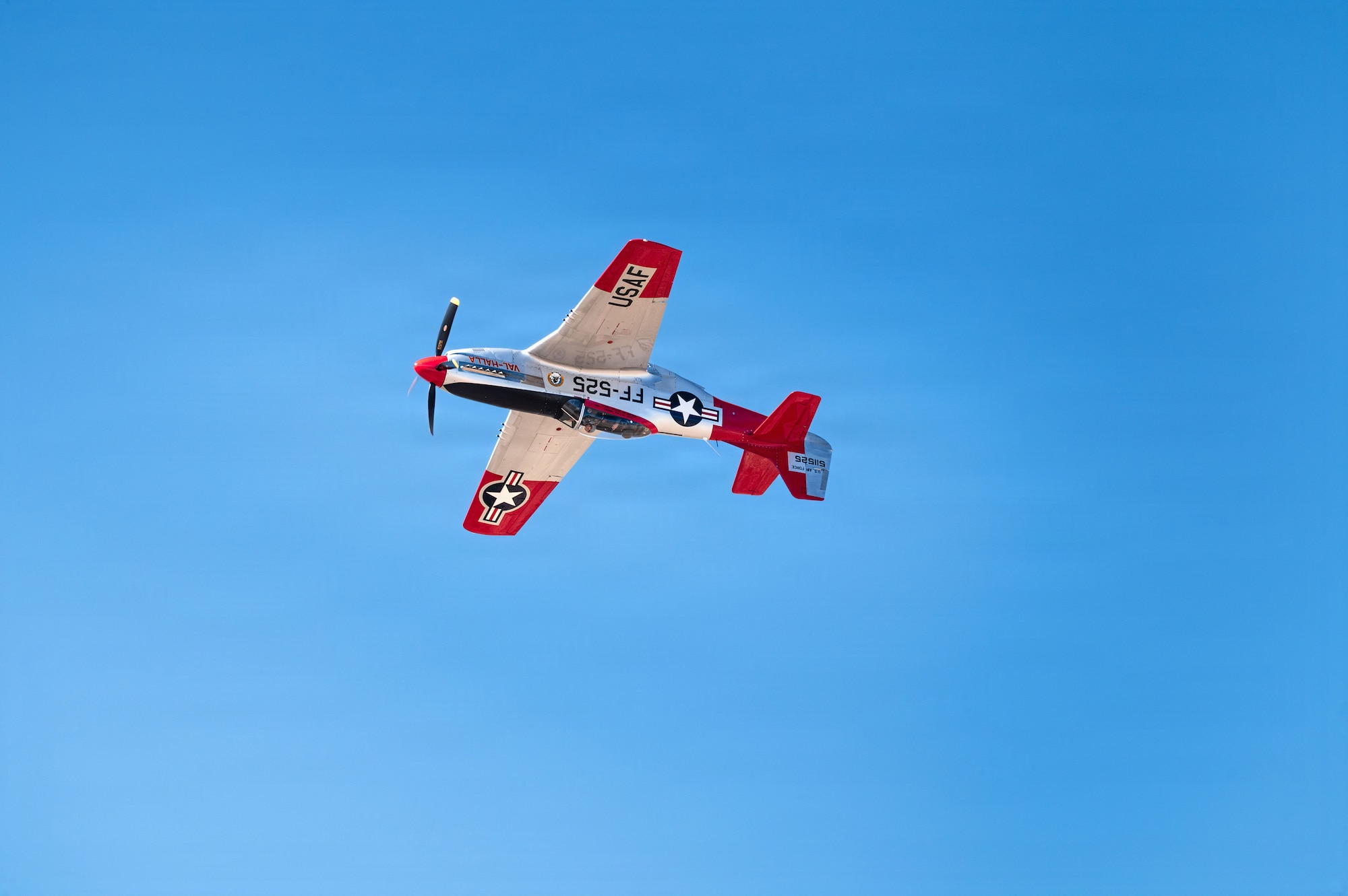 Retired U.S. Air Force Lt. Col. Greg Anders performs aerial maneuvers in his P-51 Mustang aircraft “Val Halla” during the Heritage Flight Training Course at Davis-Monthan Air Force Base, Arizona, Feb. 27, 2026. The Heritage Flight team currently consists of ten civilian pilots qualified to fly vintage warbirds in formation with modern Air Force single-ship demonstration teams. (U.S. Air Force photo by Senior Airman Jasmyne Bridgers-Matos)