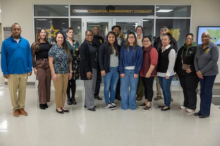 U.S. Army Financial Management Command Army Military Pay Office employees pose for a photo in front of USAFMCOM headquarters at the Maj. Gen. Emmett J. Bean Federal Center in Indianapolis Feb. 27, 2026. Eleven employees from the AMPOs at Fort Drum, Fort Bliss, Fort Bragg, Fort Rucker, Fort Irwin, Fort Gordon, West Point and Aberdeen Proving Ground attended a reserve pay course, sponsored by the U.S. Army Reserve Center, from Feb. 23-27, 2026, in Indianapolis with the primary objective of enhancing the student’s the military pay knowledge on Army Reserve and Army National Guard pay in the AMPO network. (U.S. Army photo by Mark R. W. Orders-Woempner)