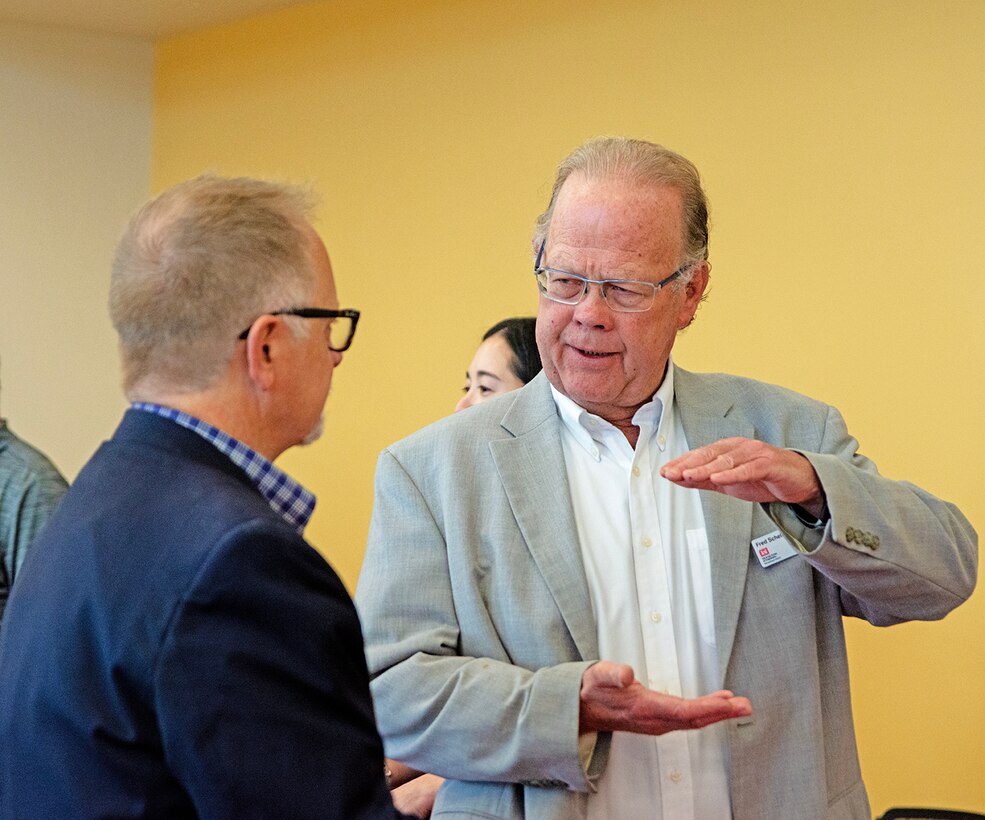 Fred Schelby, right, a project manager for Kirtland Air Force Base projects in the district’s Military and IIS Section, speaks with one of the attendees during the district’s annual Business Opportunities Open House (BOOH) at the Sid Cutter Pilot’s Pavilion at the Balloon Fiesta Park in Albuquerque, N.M., Feb. 25, 2026.