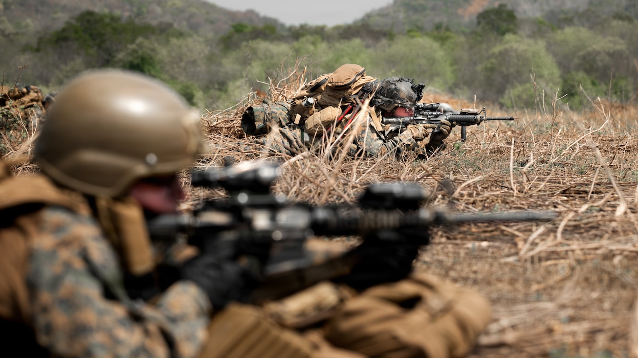 U.S. Marines assigned to Task Force Ashland, I Marine Expeditionary Force, maintain security ashore while conducting operations at sea as part of Exercise Cobra Gold 2026 at Hat Yao Beach, Rayong, Thailand, Feb. 26, 2026.