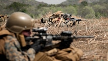 U.S. Marines assigned to Task Force Ashland, I Marine Expeditionary Force, maintain security ashore while conducting operations at sea as part of Exercise Cobra Gold 2026 at Hat Yao Beach, Rayong, Thailand, Feb. 26, 2026.