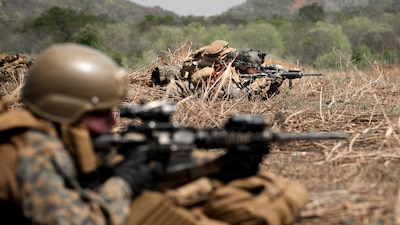 U.S. Marines assigned to Task Force Ashland, I Marine Expeditionary Force, maintain security ashore while conducting operations at sea as part of Exercise Cobra Gold 2026 at Hat Yao Beach, Rayong, Thailand, Feb. 26, 2026.