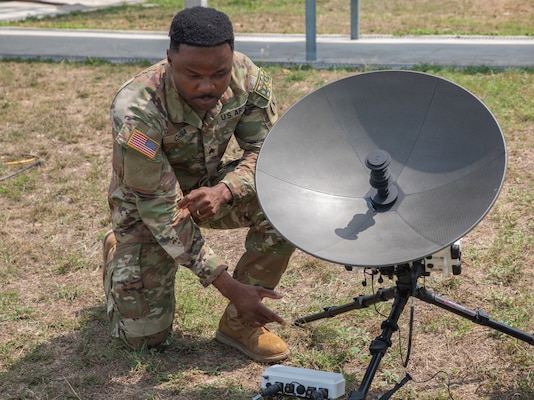 U.S. Army Sgt. Stanley Chima, assigned to 3rd Multi-Domain Task Force, adjusts components of a Tampa satellite aperture during Exercise Cobra Gold 2026 at U-Tapao Royal Thai Navy Airfield, Thailand, Feb. 25, 2026.