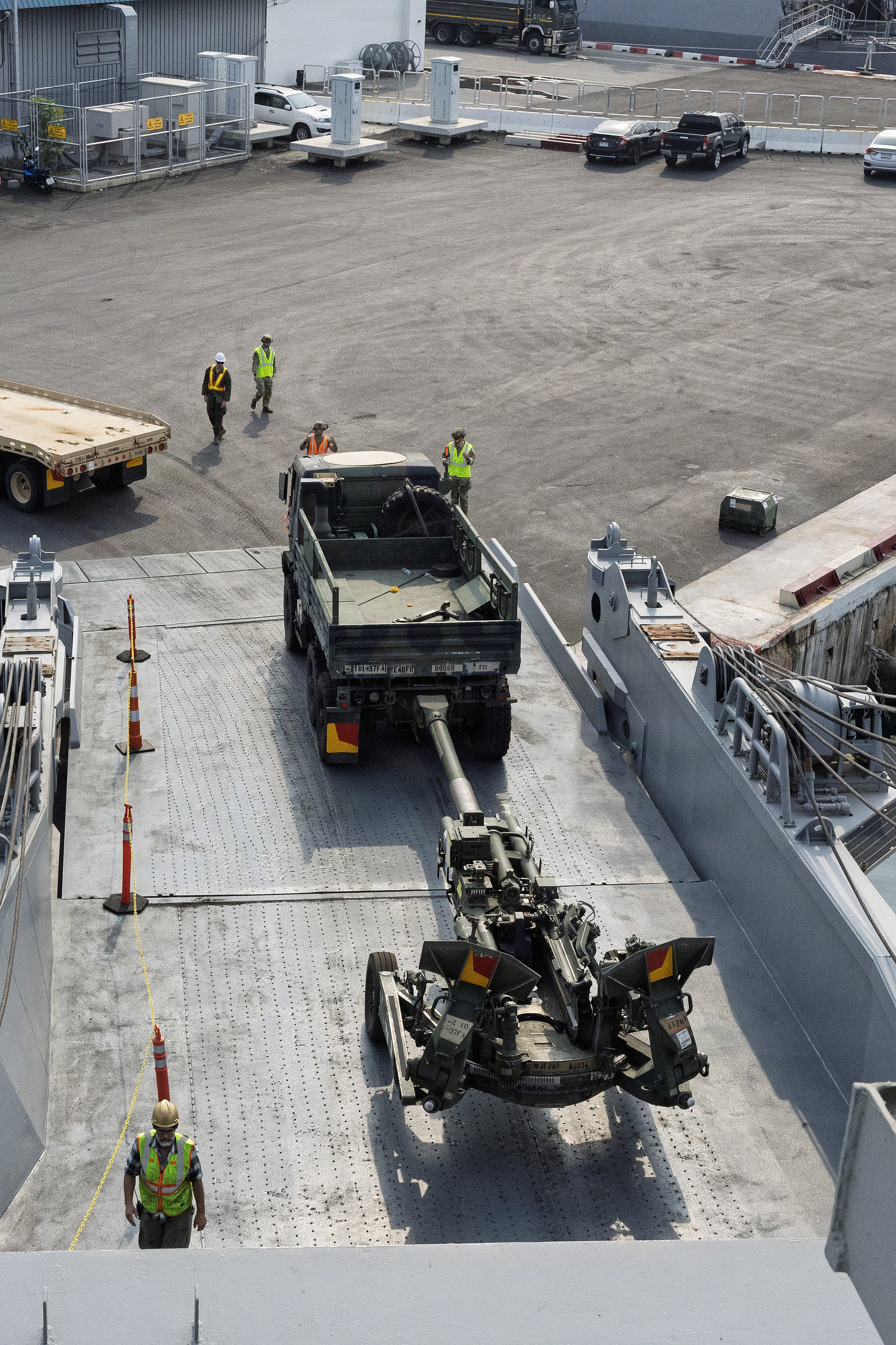Military equipment is discharged from Military Sealift Command (MSC) chartered steam ship Cape Island (T-AKR 10) at the port of Chuk Samet, Sattahip, Thailand, Feb. 18, 2026, during an offload of equipment that will be used in Joint Exercise Cobra Gold 2026.