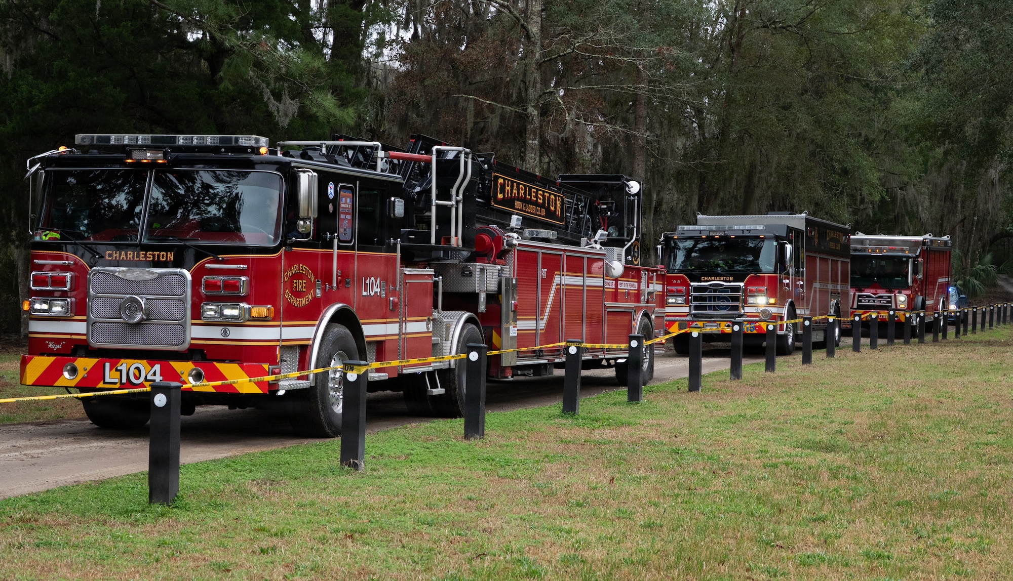 Fire trucks convoy into the training area.