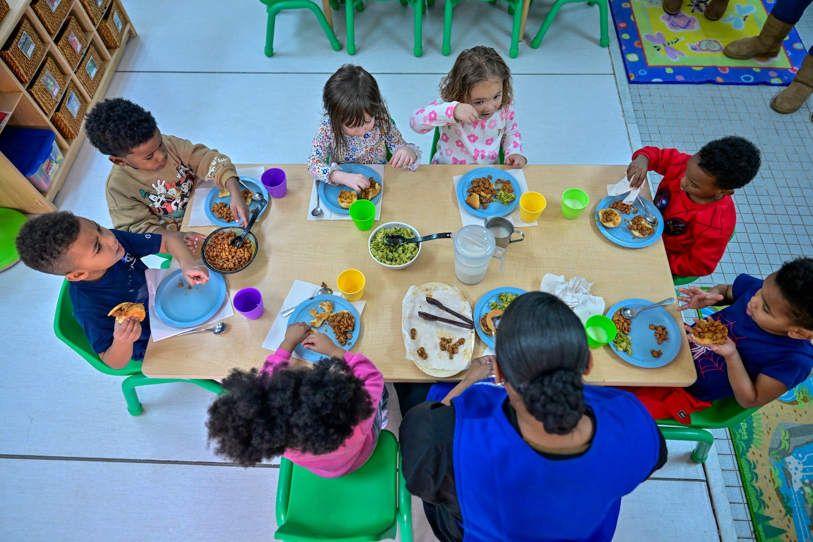 Children enjoy family style dining at DSCR's CDC