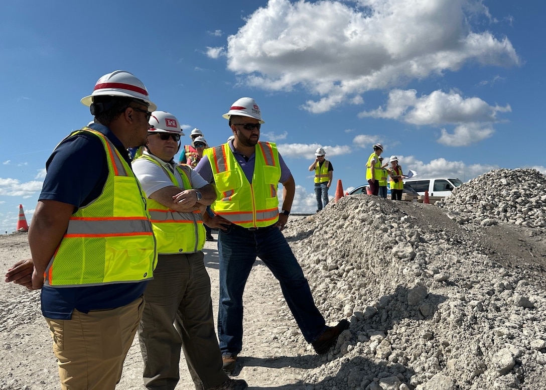 Larbi Kandil, chief and February team lead for the U.S. Army Corps of Engineers Jacksonville District Leadership Development Program, reviews construction aggregate materials with program participants during a February 2025 site visit in Southern Florida. Kandil coordinated the multi-day field engagement to provide emerging leaders with hands-on exposure to construction quality assurance, mission planning and integrated project delivery in support of South Florida Ecosystem Restoration efforts. (U.S. Army Corps of Engineers photo by Public Affairs Specialist Misty Cunningham)