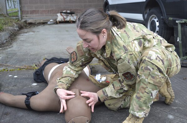 eye impairment urgency…Under the watchful gaze of Navy Medicine Readiness Training Command Bremerton Tactical Combat Casualty Care instructors, 315th Aeromedical Evacuation Squadron personnel hone their medical response skills in treating traumatic injuries on the field of battle. The visiting Air Force personnel from Charleston Air Force Base, South Carolina, received intensive didactic module training before undergoing and completing their educational effort with actual hands-on application in the field. Amidst a mock firefight exploding around them, faux patient screams and bellowing demands from instructors, the 315th team were tested on conducting – with timely urgency - primary and secondary assessments, casualty movement, airway management, hemorrhage control, chest needle decompression, applying splinting and pressure dressings, and more (Official Navy photo by Douglas H Stutz, NHB/NMRTC Bremerton public affairs officer).