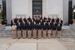 170226-N-JC800-1002 BETHESDA, Md. (Feb. 17, 2026) - Students a part of the Advanced Readiness Officer Course host by Naval Medical Leader and Professional Development Command pose for a group photo on the front steps at Walter Reed National Military Medical Center. (U.S. Navy photo by Mass Communication Specialist 1st Class Heath Zeigler/Released)