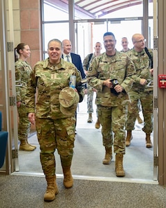 Airmen walking into building