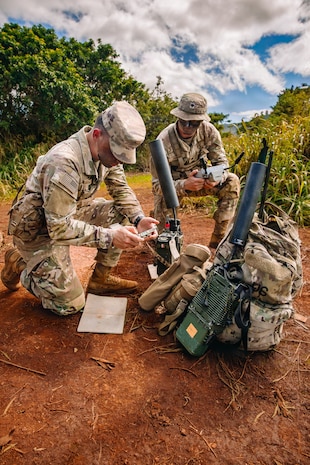 U.S. Army Forward Observers with the 25th Infantry Division Artillery use the Next Generation Command and Control prototype to send a digital fire mission from an observation post during Lightning Surge 2 at Schofield Barracks, Hawaii, Feb. 25, 2026.