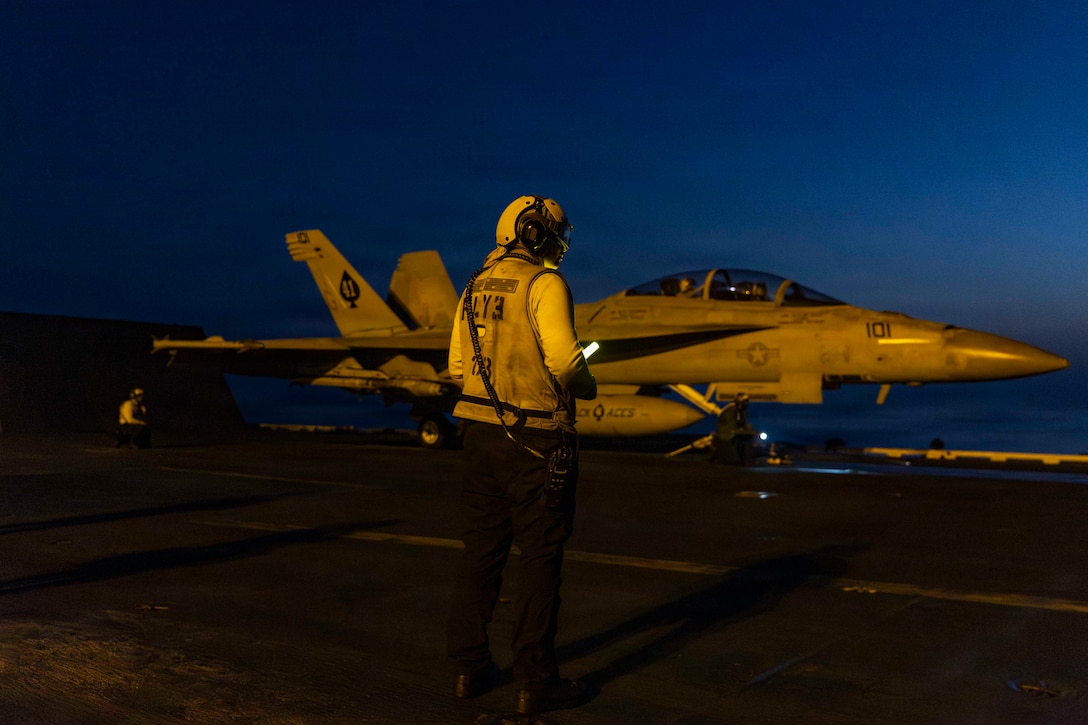 An F/A-18F Super Hornet, attached to Strike Fighter Squadron (VFA) 41, prepares to launch from the flight deck of Nimitz-class aircraft carrier USS Abraham Lincoln (CVN 72) in support of Operation Epic Fury, March 2, 2026. (U.S. Navy photo)