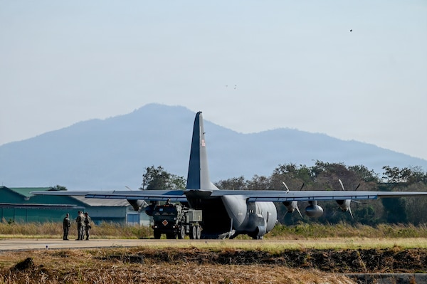 U.S. Airmen assigned to the 39th Airlift Squadron work alongside U.S. Soldiers from the Bravo Battery, 1st Battalion, 94th Field Artillery Regiment, 17th Field Artillery Brigade to load an M142 High Mobility Artillery Rocket System (HIMARS) onto a U.S. Air Force C-130J Super Hercules in support of a High Mobility Artillery Rocket System Rapid Infiltration (HIRAIN)  training during Exercise Cobra Gold 2026 at Lopburi, Thailand, March 1, 2026.