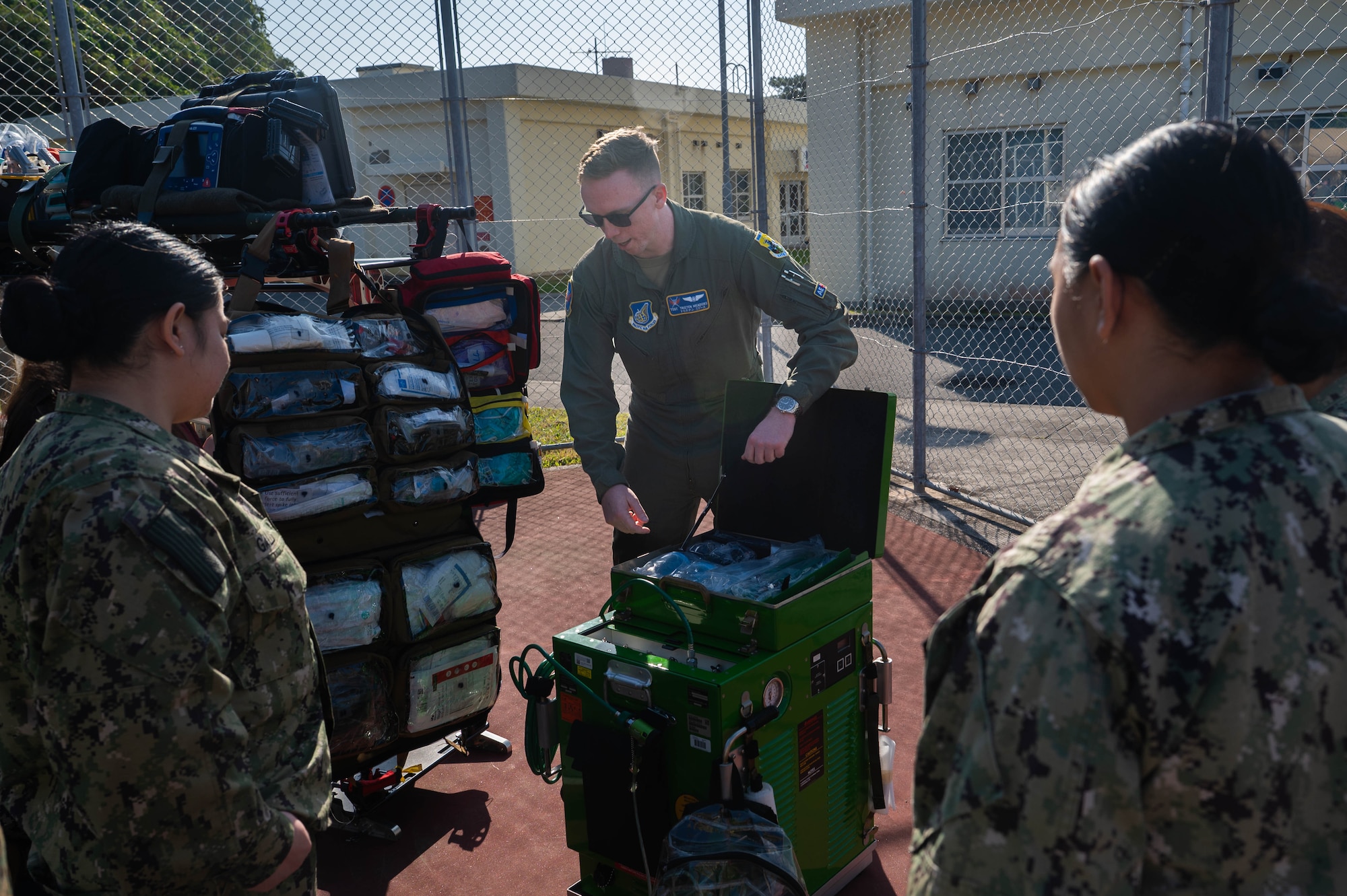 A man explains the details of in-flight care machinery
