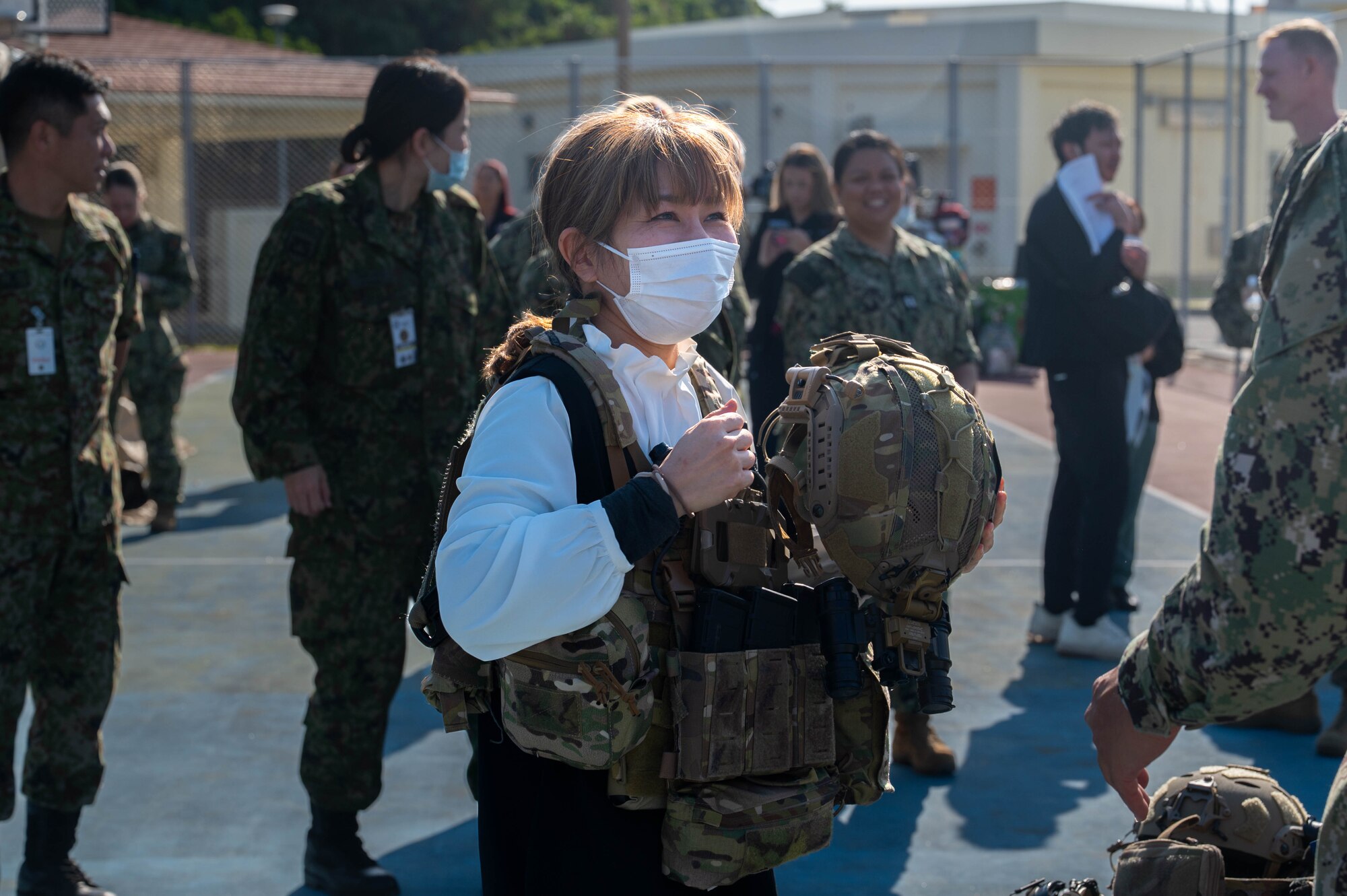 A japanese woman wears american Special operations gear