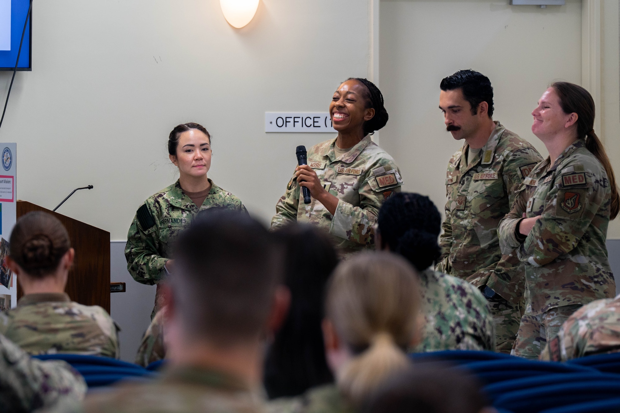 People laugh in a crowd