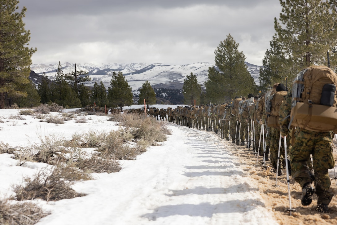 U.S. Marines with 2nd Combat Engineer Battalion, 2nd Marine Division conduct an acclimation hike during Mountain Training Exercise 2-26 at Marine Corps Mountain Warfare Training Center, Bridgeport, California, Feb. 25, 2026. MTX 2-26 is designed to prepare units to survive, strengthen expeditionary warfare tactics, and build confidence in their abilities to operate in a cold weather, high-altitude, mountainous environment. (U.S. Marine Corps photo by Cpl. Jesse Davis)