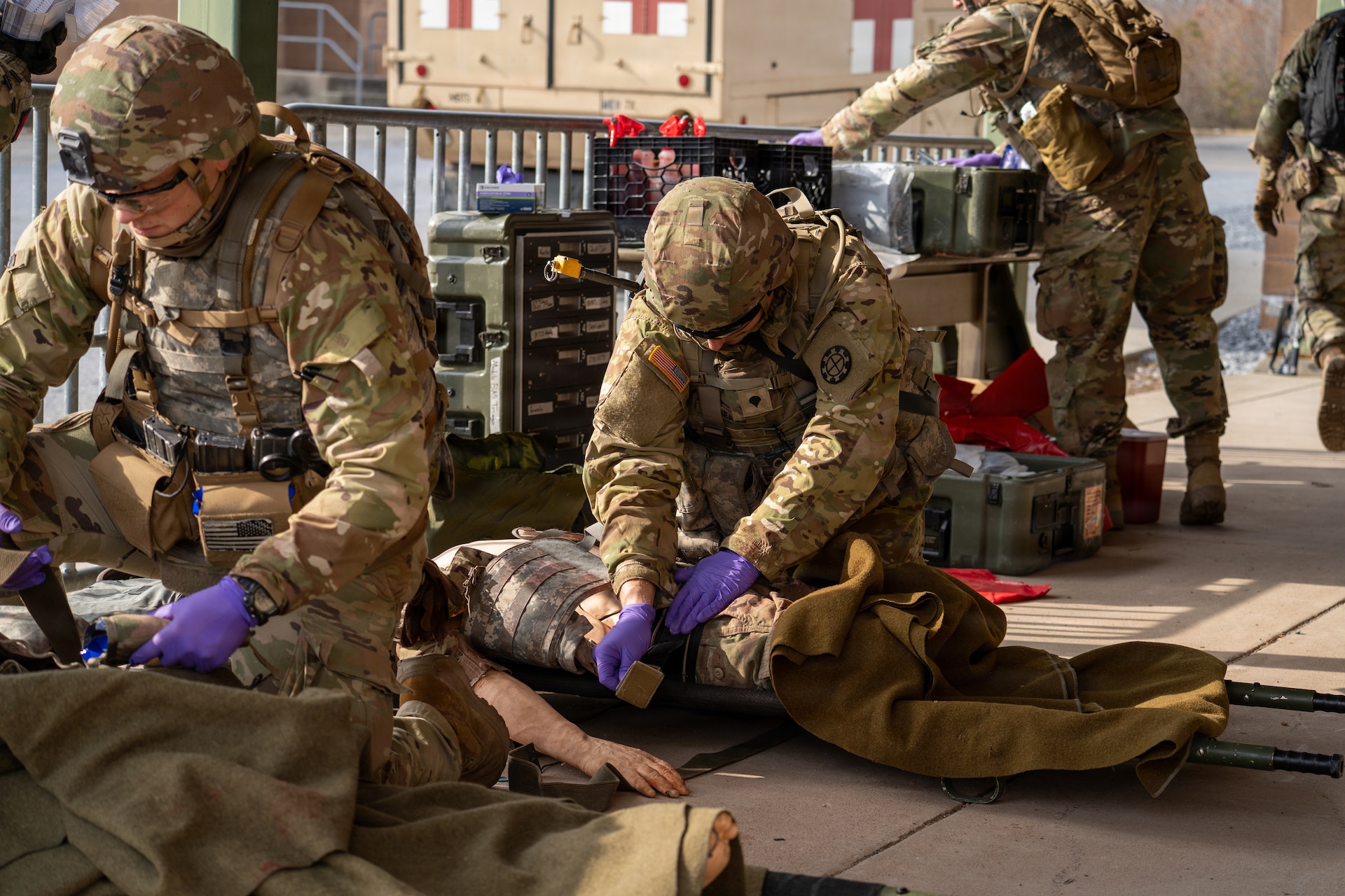 U.S. Soldiers participate in a culminating event exercise as a part of the 68W Healthcare Specialist Military Occupational Specialty Transition course at Fort Indiantown Gap, Pennsylvania, March 1, 2026. The course is conducted by the 166th Regiment - Regional Training Institute's Medical Battalion Training Site and prepares Soldiers to be combat medics. (U.S. Army National Guard photo by Sgt. Kayden Bedwell)