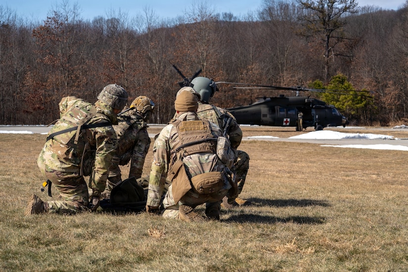 U.S. Soldiers participate in a culminating event exercise as a part of the 68W Healthcare Specialist Military Occupational Specialty Transition course at Fort Indiantown Gap, Pennsylvania, March 1, 2026. The course is conducted by the 166th Regiment - Regional Training Institute's Medical Battalion Training Site and prepares Soldiers to be combat medics. (U.S. Army National Guard photo by Sgt. Kayden Bedwell)