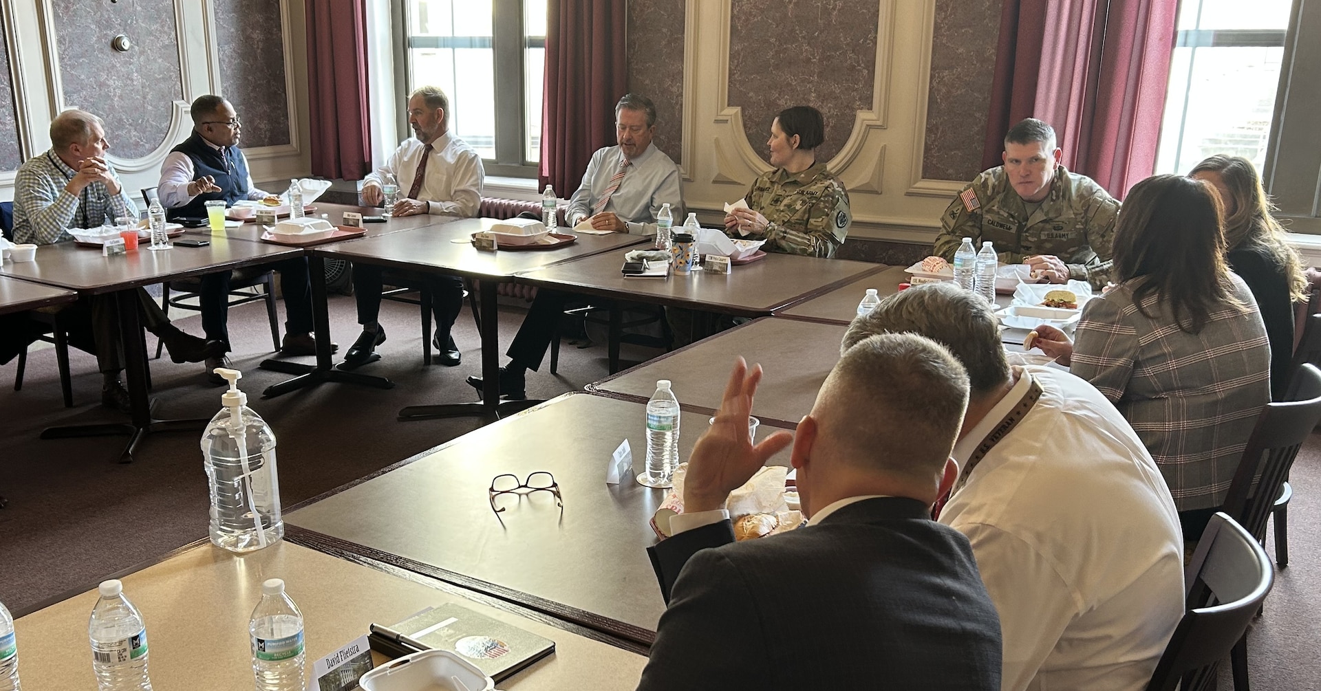 DLA senior leaders enjoy a meal in the historic Hart-Dole-Inouye Federal Center cafeteria that hosted other famous people such as Adrian Cronauer, Bob Hope, and Amelia Earhart.