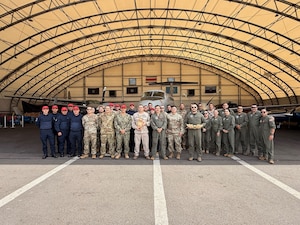 a group poses for a photo