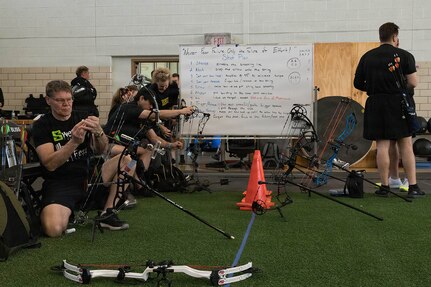 Competitors in an archery competition, part of Army Trials 2026, prepare their gear March 3, 2026, at the Ronald D. Milam Physical Fitness Center at Fort Bliss, Texas.