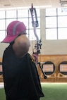 U.S. Army Master Sgt. Jodi Pyle-VanderSys, a chemical, biological, radiological, and nuclear specialist assigned to the Soldier Recovery Unit at Fort Carson, looses an arrow during an archery competition March 3, 2026.
